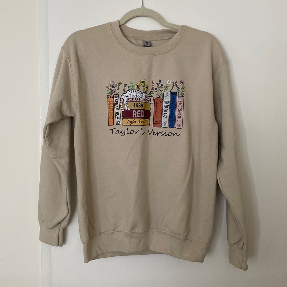 Taylor Swift’s book Version sweatshirt